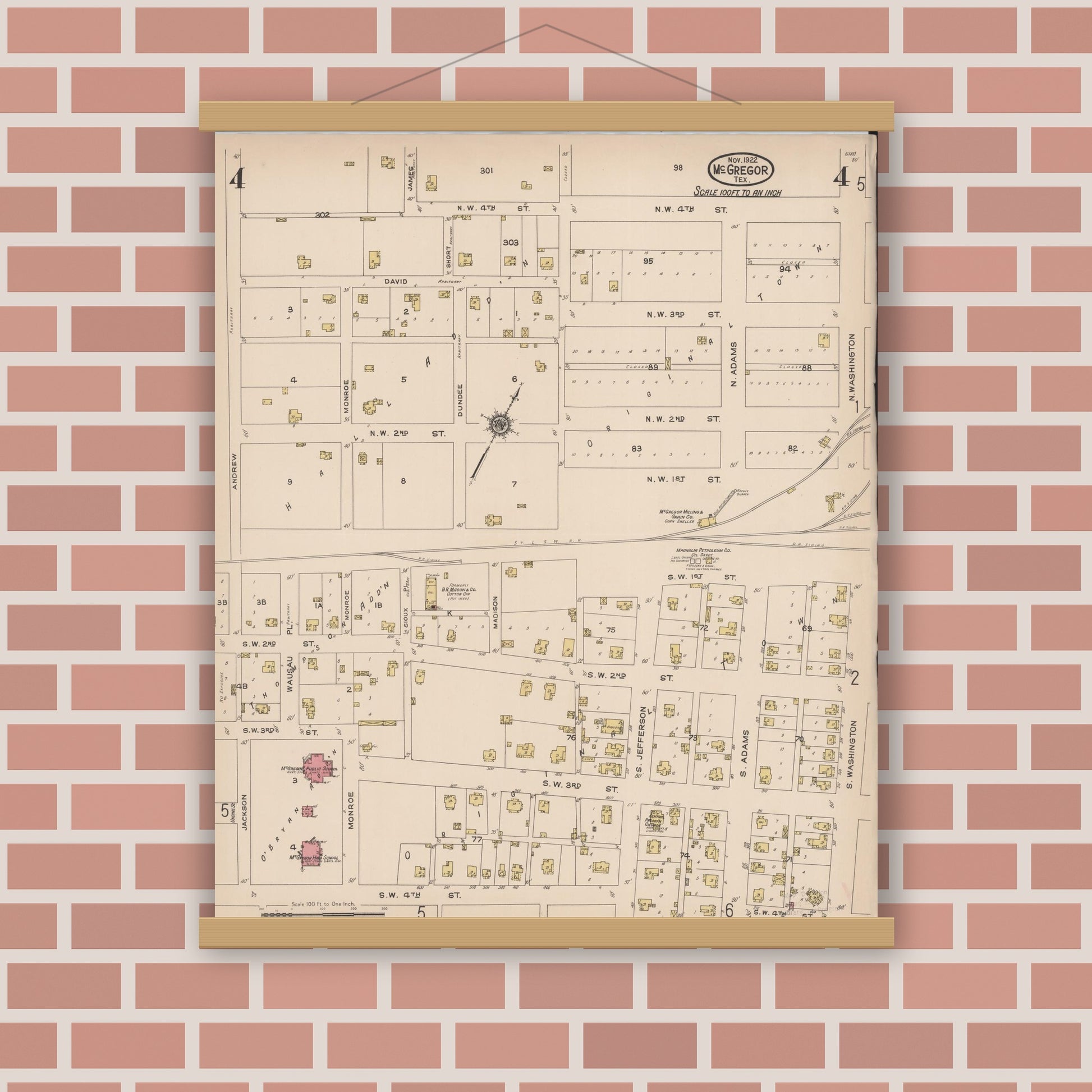 Old map wall art mockup — magnetic wood frame on brick wall — Sanborn Fire Insurance Map from McGregor, McLennan County, Texas (1922), Sheet #0004