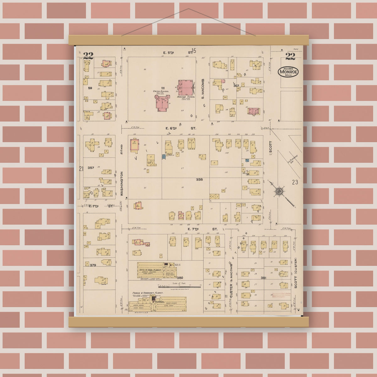 Old map wall art mockup — magnetic wood frame on brick wall — Sanborn Fire Insurance Map from Monroe, Monroe County, Michigan (1922), Sheet #0022