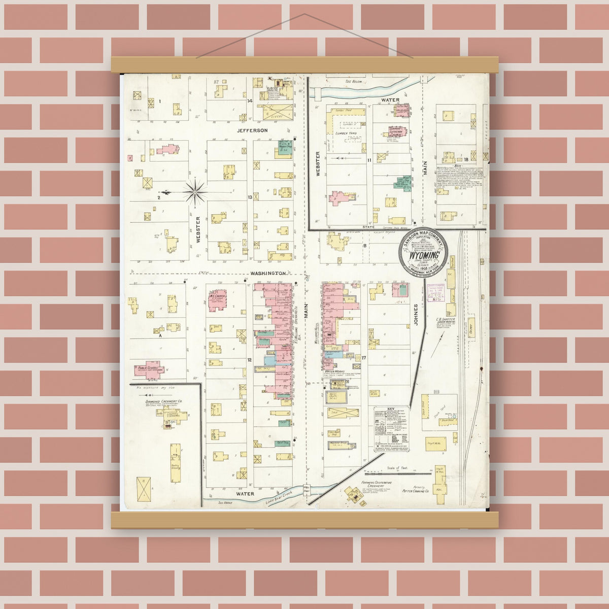 Old map wall art mockup — magnetic wood frame on brick wall — Sanborn Fire Insurance Map from Wyoming, Jones County, Iowa (1905), Sheet #0001