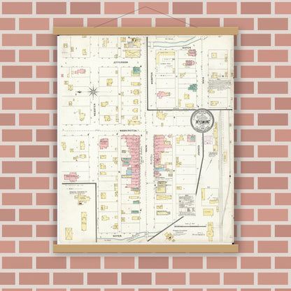 Old map wall art mockup — magnetic wood frame on brick wall — Sanborn Fire Insurance Map from Wyoming, Jones County, Iowa (1905), Sheet #0001