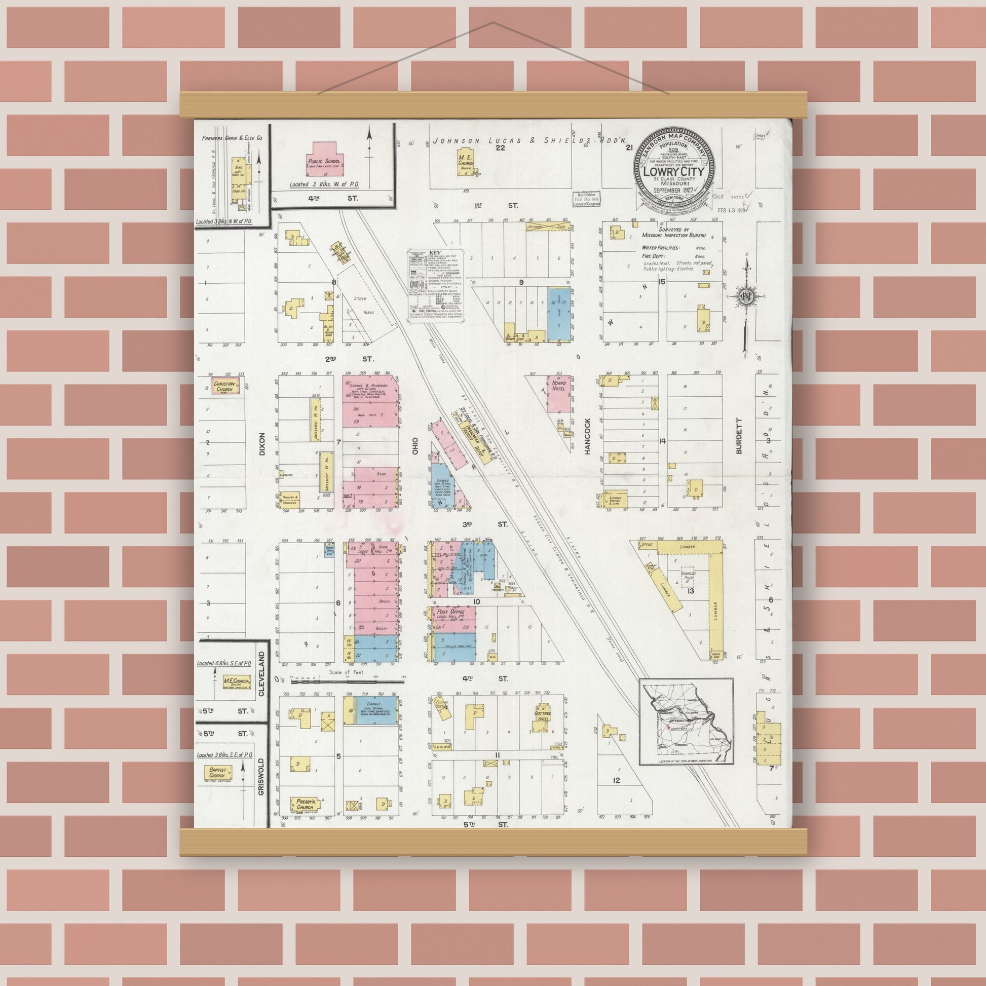 Old map wall art mockup — magnetic wood frame on brick wall — Sanborn Fire Insurance Map from Lowry City, Saint Clair County, Missouri (1927), Sheet #0001