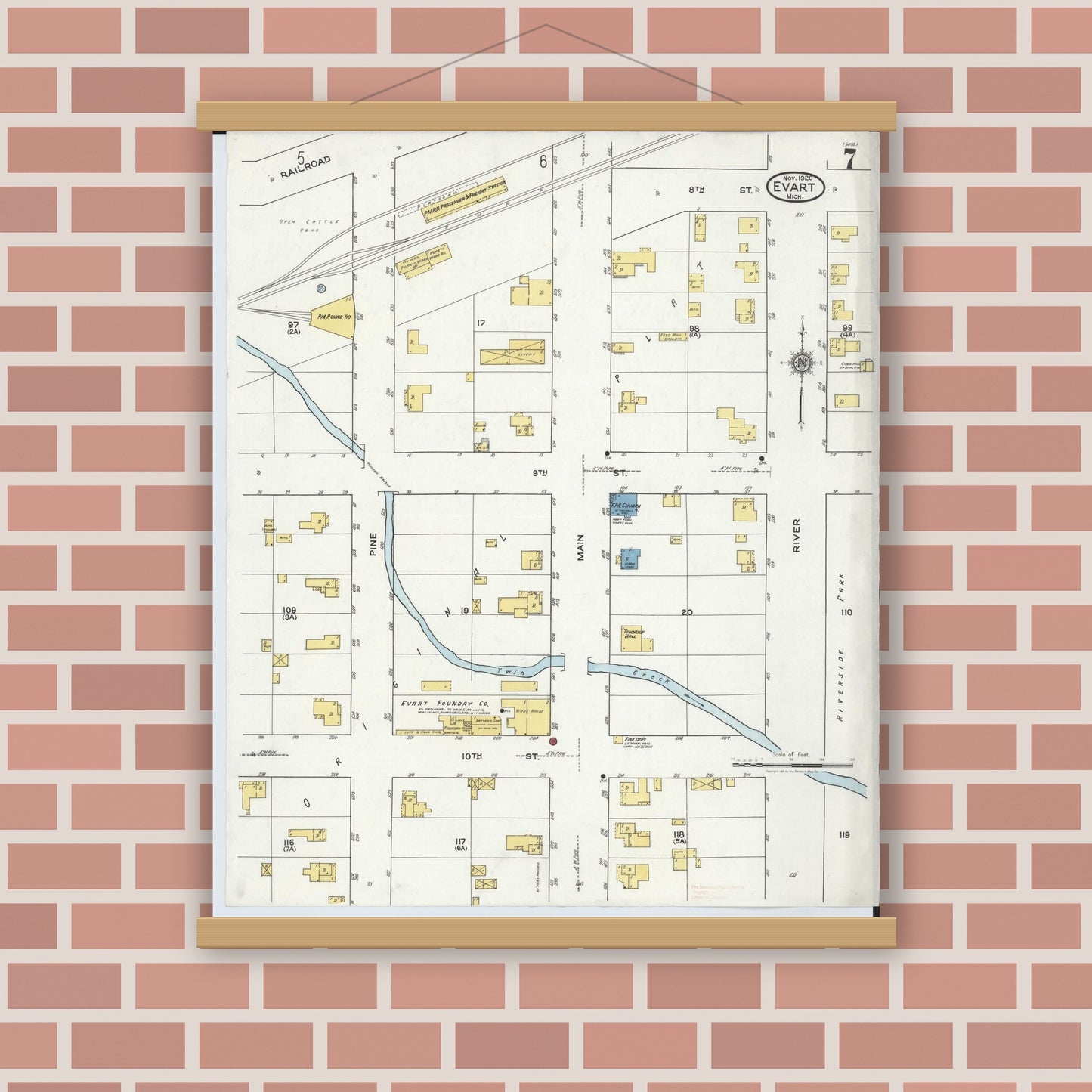 Old map wall art mockup — magnetic wood frame on brick wall — Sanborn Fire Insurance Map from Evart, Osceola County, Michigan (1920), Sheet #0007