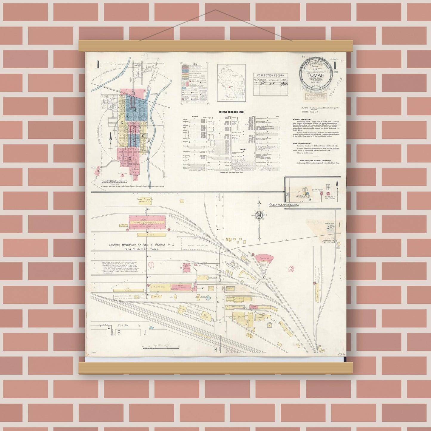 Old map wall art mockup — magnetic wood frame on brick wall — Sanborn Fire Insurance Map from Tomah, Monroe County, Wisconsin (1944), Sheet #0001