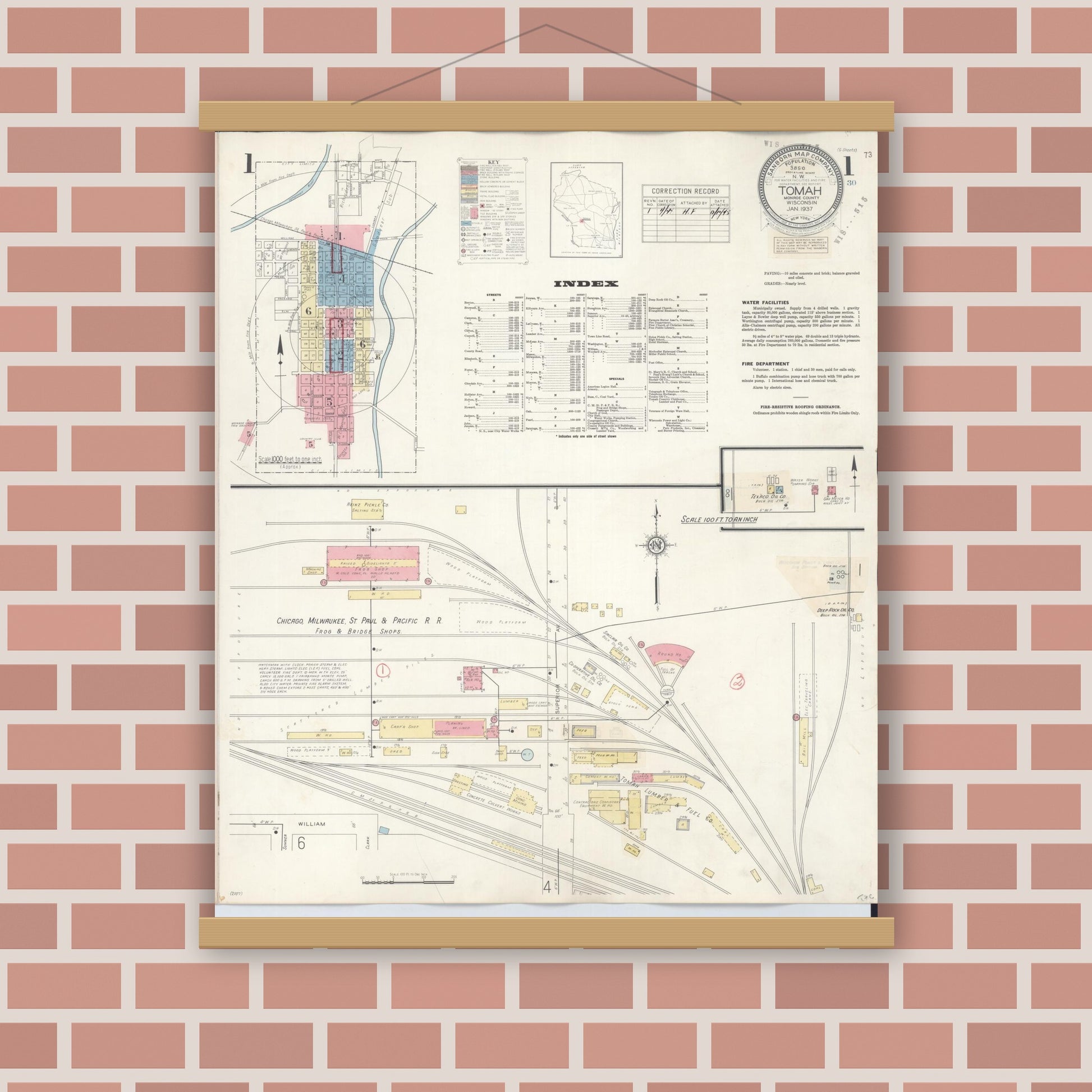 Old map wall art mockup — magnetic wood frame on brick wall — Sanborn Fire Insurance Map from Tomah, Monroe County, Wisconsin (1944), Sheet #0001