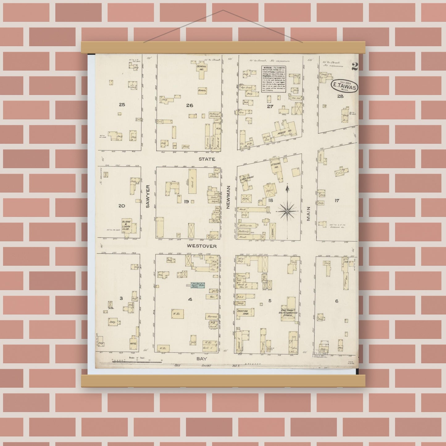 Old map wall art mockup — magnetic wood frame on brick wall — Sanborn Fire Insurance Map from East Tawas, Iosco County, Michigan (1884), Sheet #0002