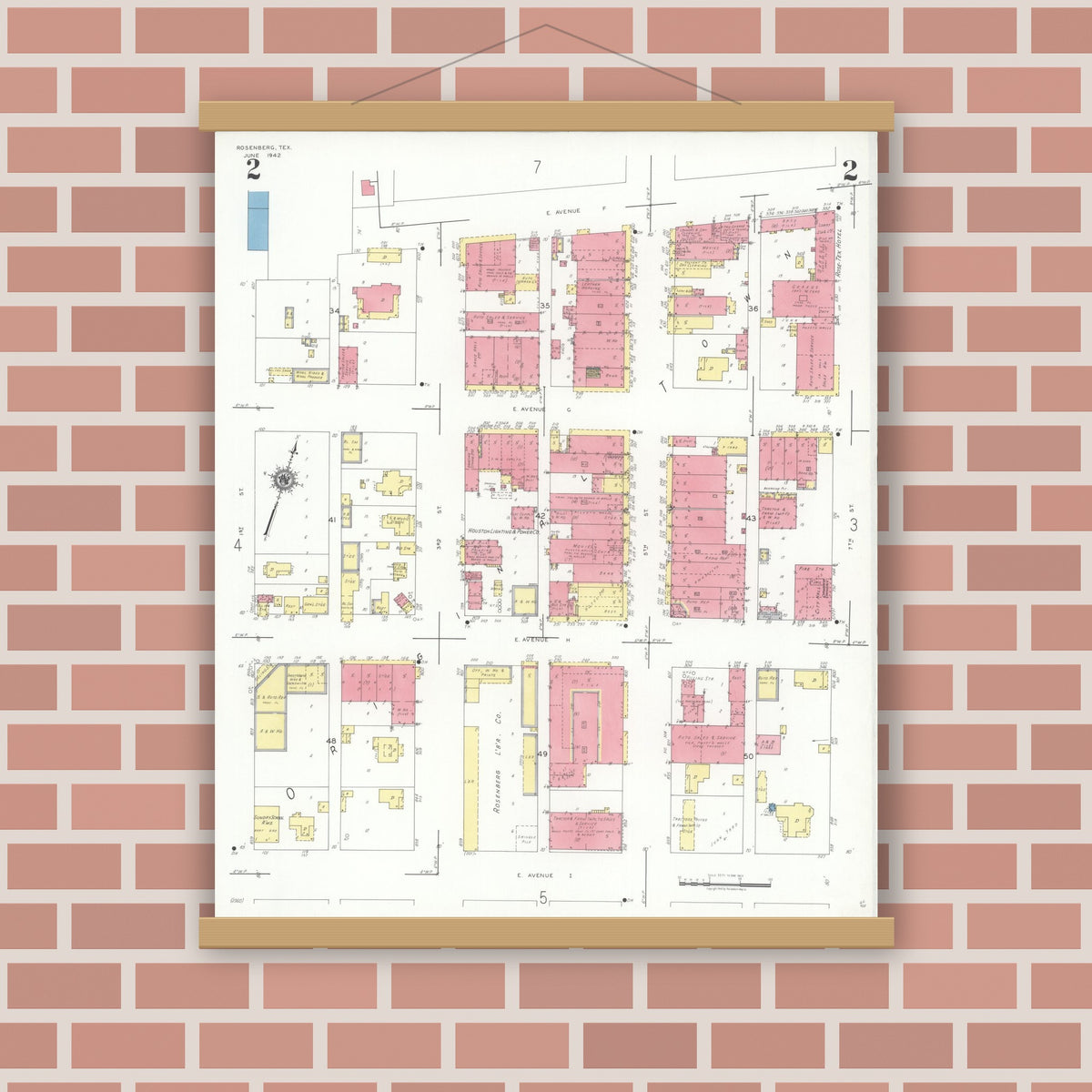 Old map wall art mockup — magnetic wood frame on brick wall — Sanborn Fire Insurance Map from Rosenberg, Fort Bend County, Texas (1942), Sheet #0002