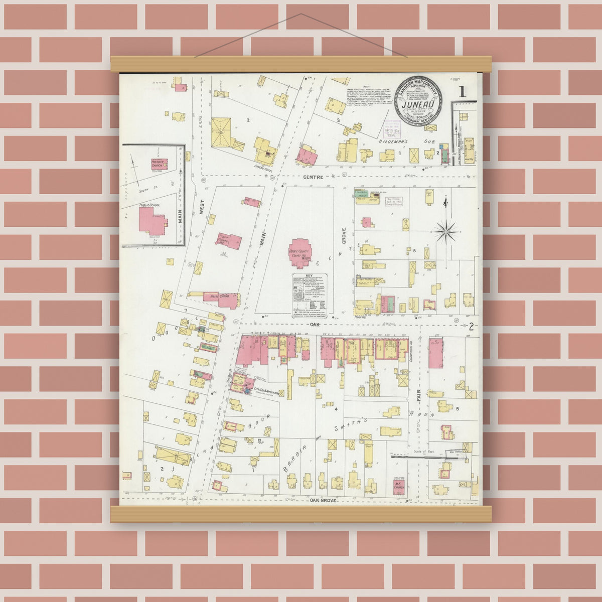 Old map wall art mockup — magnetic wood frame on brick wall — Sanborn Fire Insurance Map from Juneau, Dodge County, Wisconsin (1904), Sheet #0001
