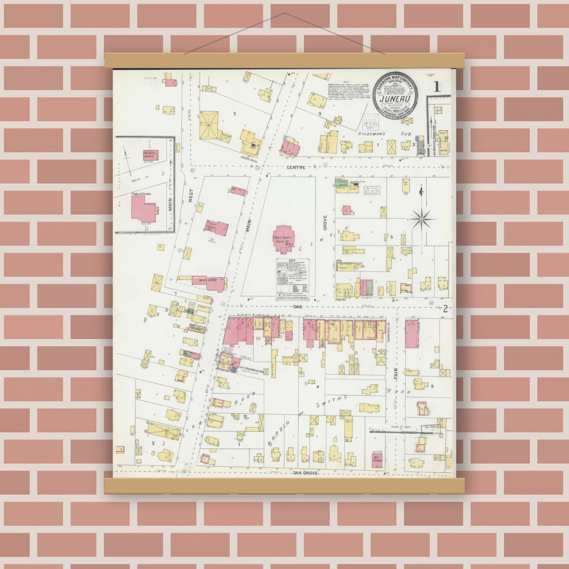 Old map wall art mockup — magnetic wood frame on brick wall — Sanborn Fire Insurance Map from Juneau, Dodge County, Wisconsin (1904), Sheet #0001