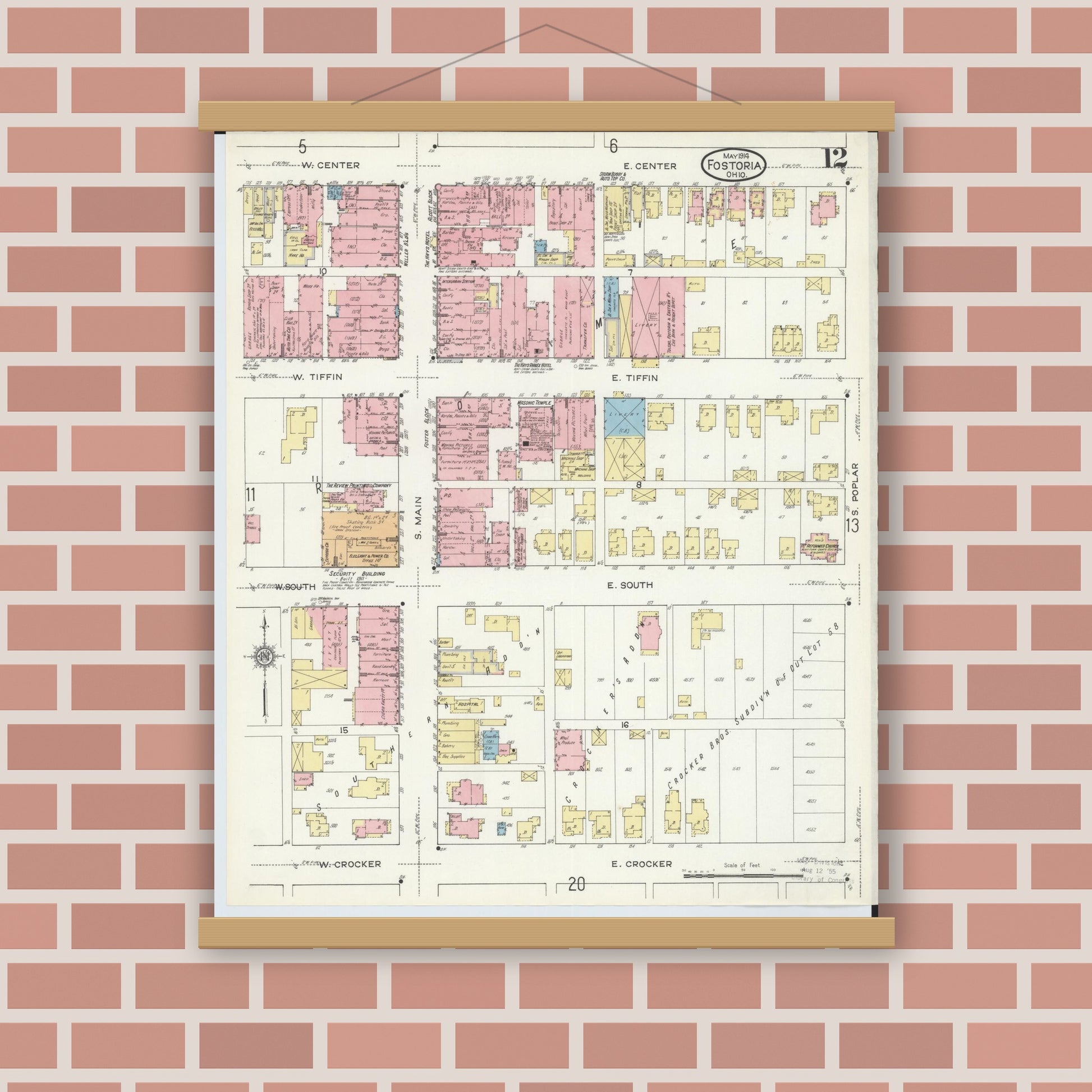Old map wall art mockup — magnetic wood frame on brick wall — Sanborn Fire Insurance Map from Fostoria, Seneca, Hancock, And Wood Counties, Ohio (1914), Sheet #0012