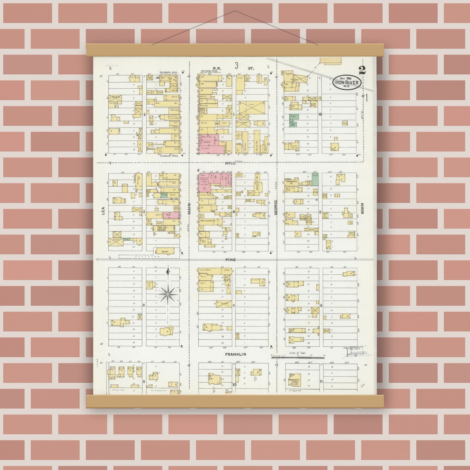 Old map wall art mockup — magnetic wood frame on brick wall — Sanborn Fire Insurance Map from Iron River, Bayfield County, Wisconsin (1904), Sheet #0002