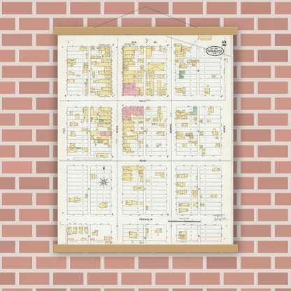 Old map wall art mockup — magnetic wood frame on brick wall — Sanborn Fire Insurance Map from Iron River, Bayfield County, Wisconsin (1904), Sheet #0002