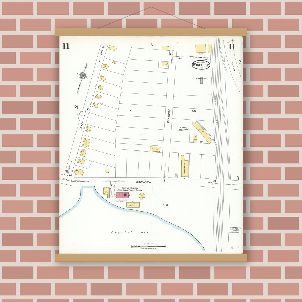Old map wall art mockup — magnetic wood frame on brick wall — Sanborn Fire Insurance Map from Wakefield, Middlesex County, Massachusetts (1923), Sheet #0011