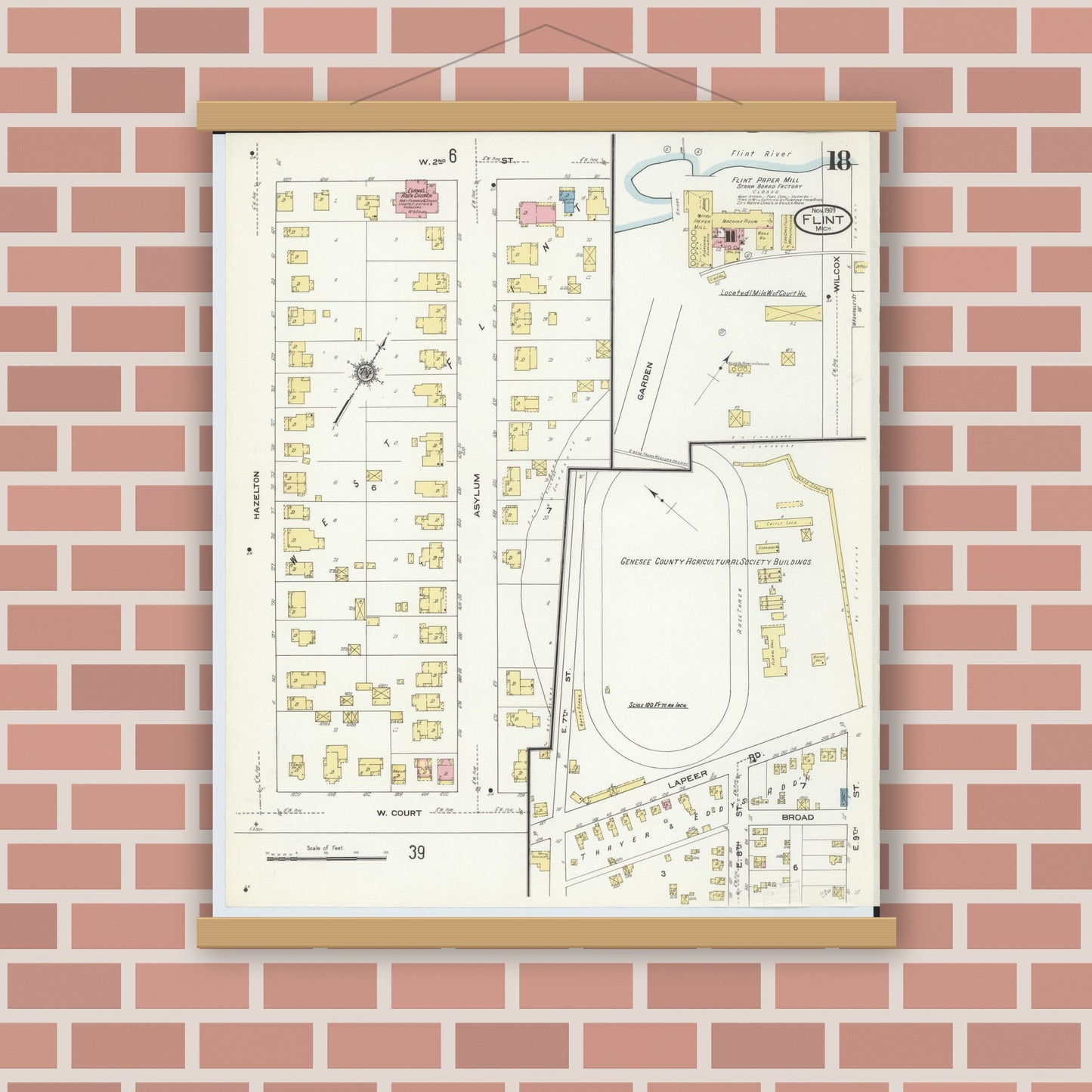 Old map wall art mockup — magnetic wood frame on brick wall — Sanborn Fire Insurance Map from Flint, Genesee County, Michigan (1909), Sheet #0018
