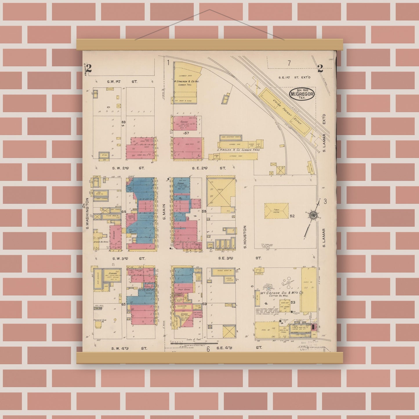 Old map wall art mockup — magnetic wood frame on brick wall — Sanborn Fire Insurance Map from McGregor, McLennan County, Texas (1922), Sheet #0002