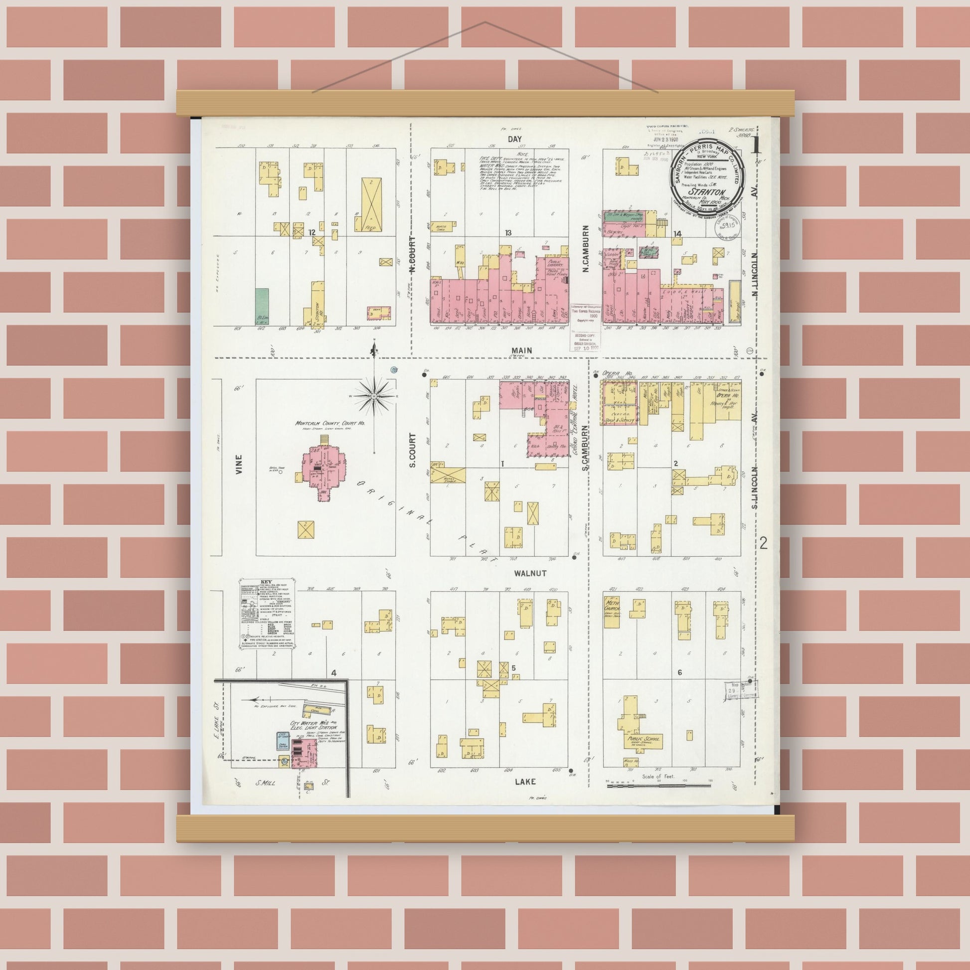 Old map wall art mockup — magnetic wood frame on brick wall — Sanborn Fire Insurance Map from Stanton, Montcalm County, Michigan (1900), Sheet #0001