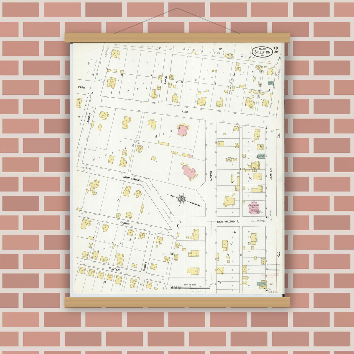 Old map wall art mockup — magnetic wood frame on brick wall — Sanborn Fire Insurance Map from Sikeston, Scott County, Missouri (1910), Sheet #0002