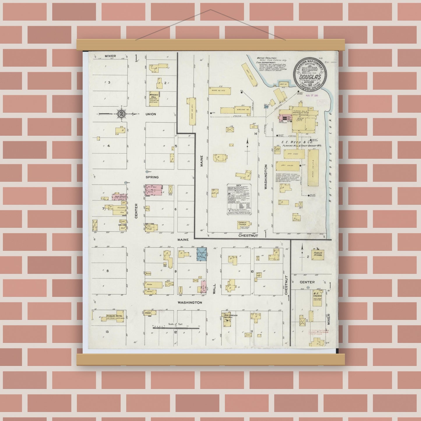 Old map wall art mockup — magnetic wood frame on brick wall — Sanborn Fire Insurance Map from Douglas, Allegan County, Michigan (1910), Sheet #0001