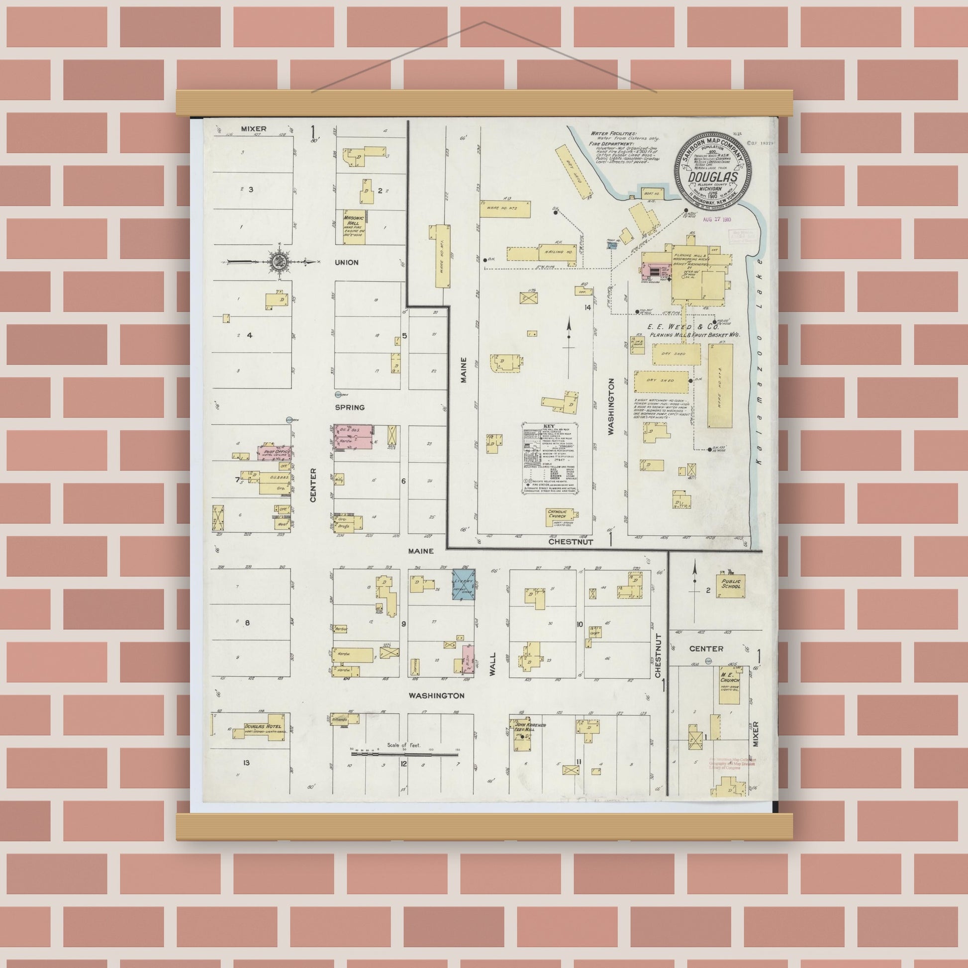 Old map wall art mockup — magnetic wood frame on brick wall — Sanborn Fire Insurance Map from Douglas, Allegan County, Michigan (1910), Sheet #0001