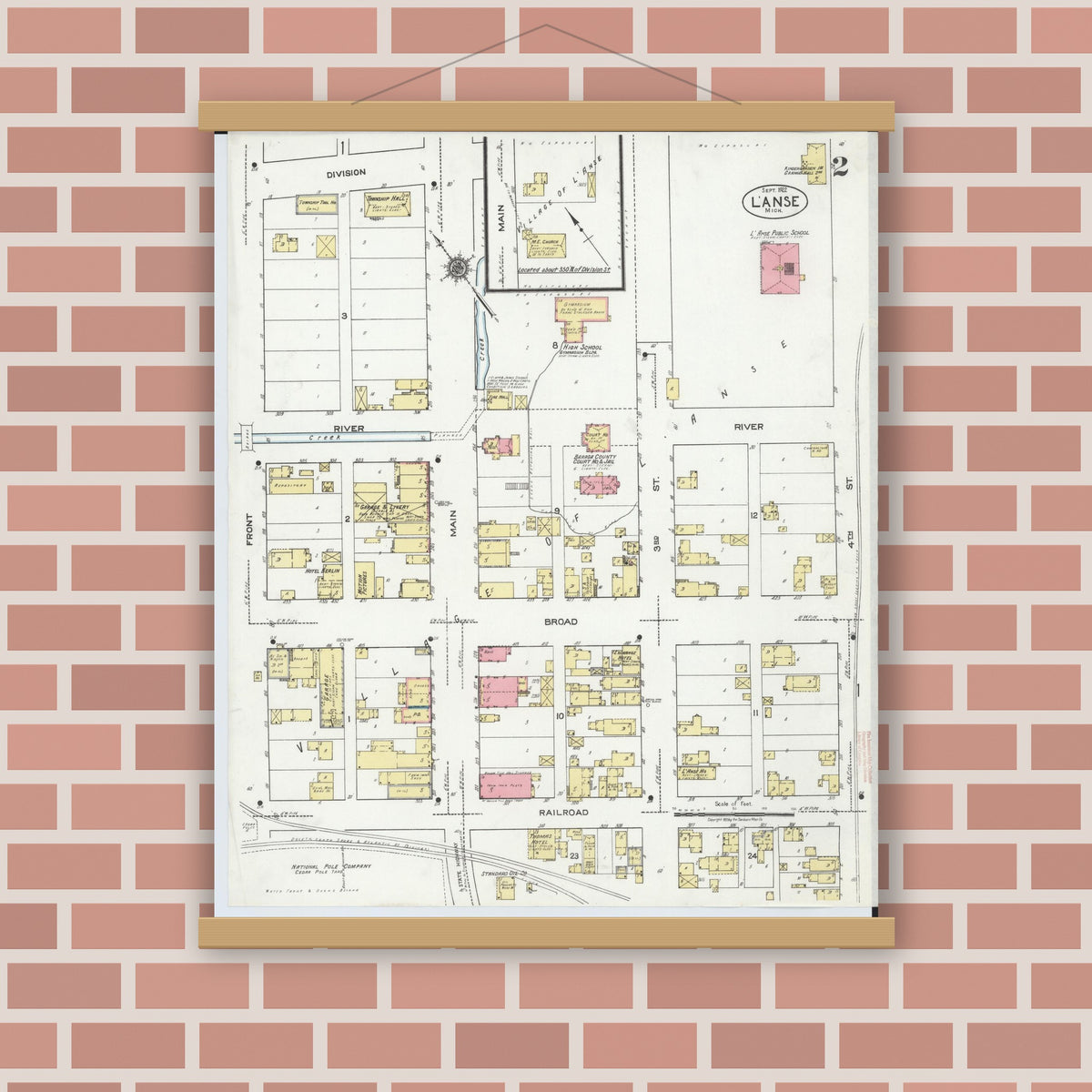 Old map wall art mockup — magnetic wood frame on brick wall — Sanborn Fire Insurance Map from L'Anse, Baraga County, Michigan (1922), Sheet #0002