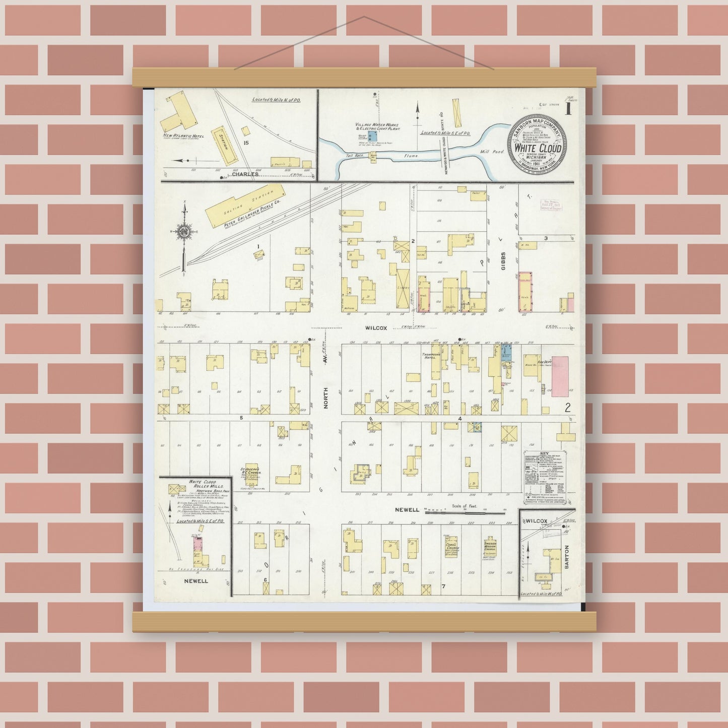 Old map wall art mockup — magnetic wood frame on brick wall — Sanborn Fire Insurance Map from White Cloud, Newaygo County, Michigan (1911) - Complete Map Set