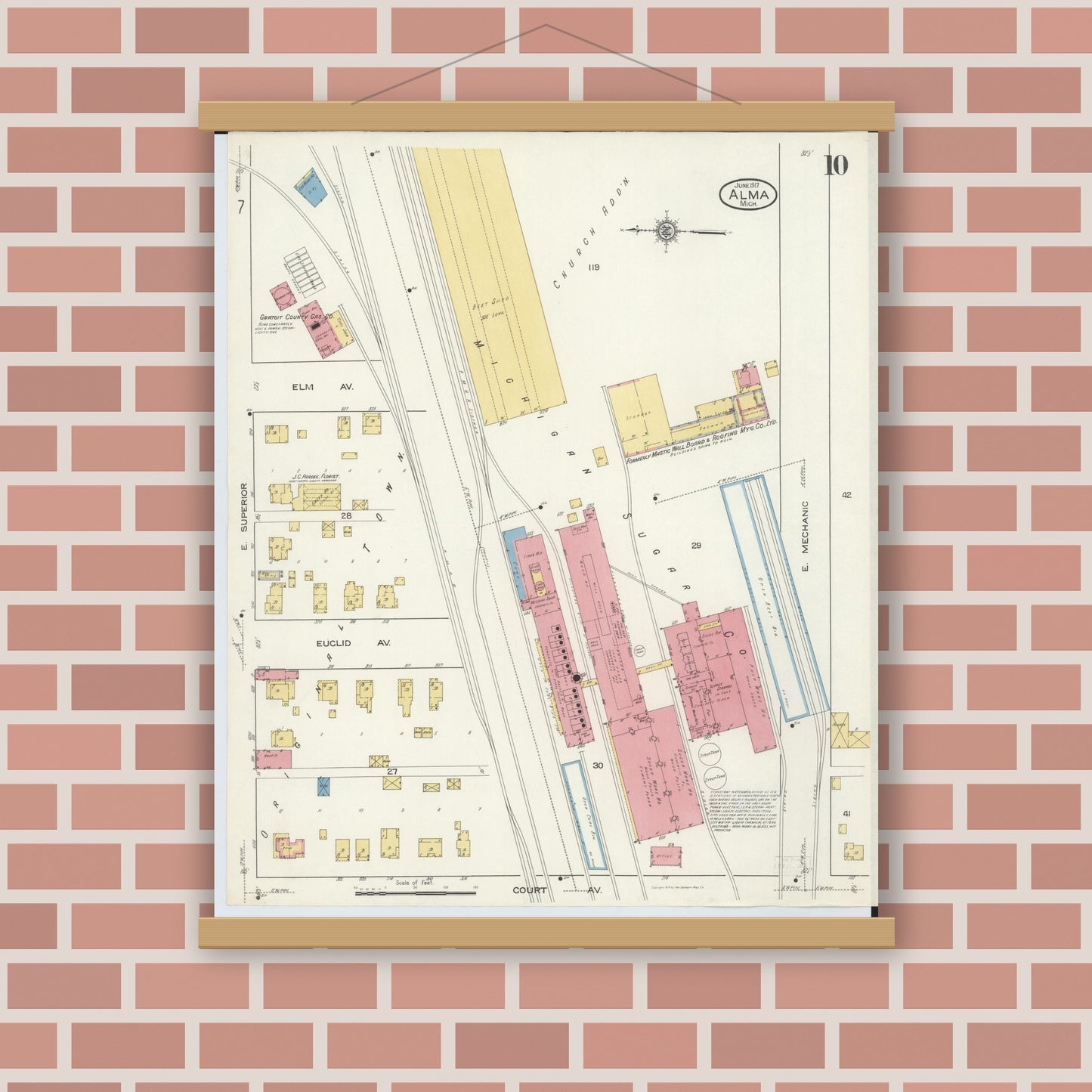 Old map wall art mockup — magnetic wood frame on brick wall — Sanborn Fire Insurance Map from Alma, Gratiot County, Michigan (1917), Sheet #0010