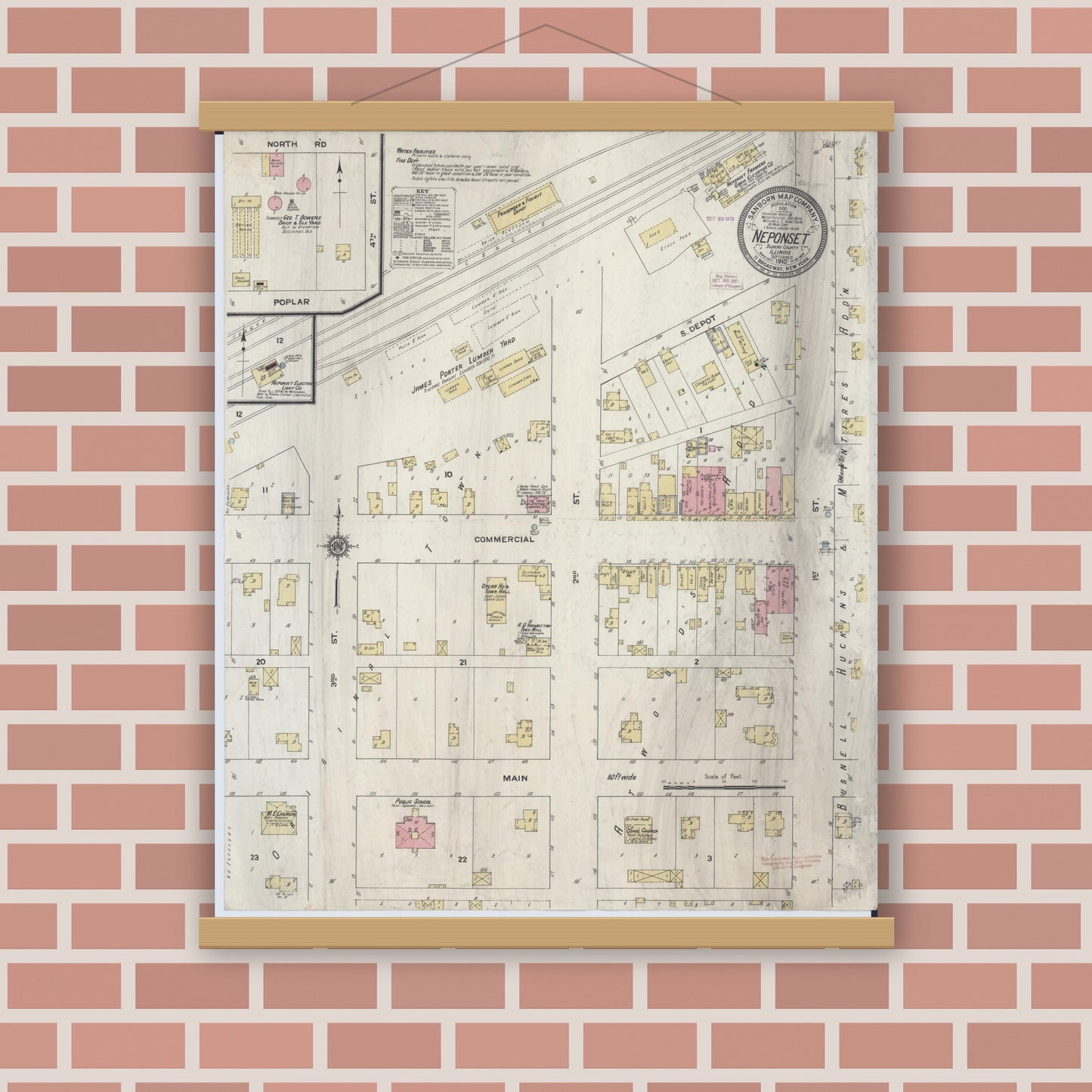 Old map wall art mockup — magnetic wood frame on brick wall — Sanborn Fire Insurance Map from Neponset, Bureau County, Illinois (1910), Sheet #0001