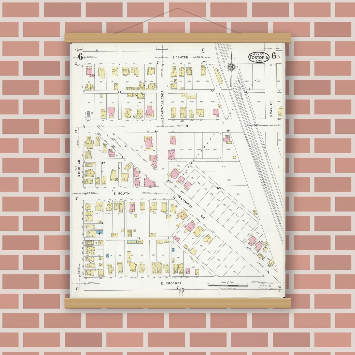 Old map wall art mockup — magnetic wood frame on brick wall — Sanborn Fire Insurance Map from Fostoria, Seneca, Hancock, And Wood Counties, Ohio (1924), Sheet #0006
