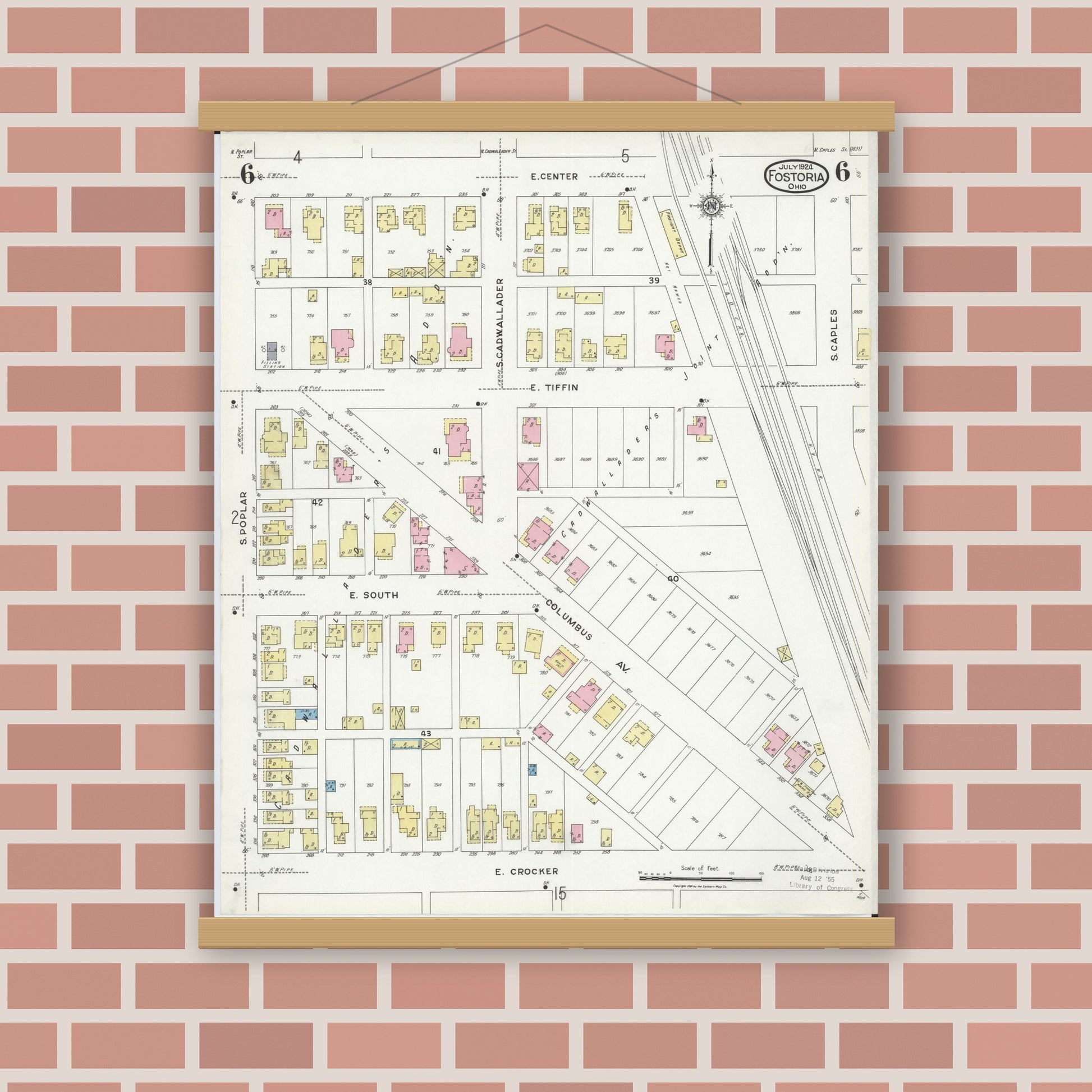 Old map wall art mockup — magnetic wood frame on brick wall — Sanborn Fire Insurance Map from Fostoria, Seneca, Hancock, And Wood Counties, Ohio (1924), Sheet #0006