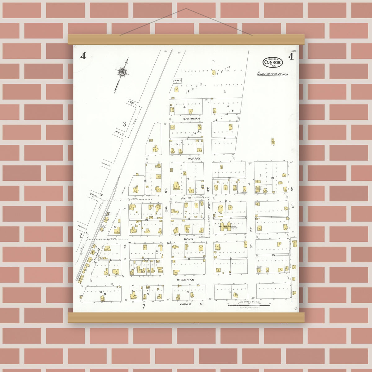 Old map wall art mockup — magnetic wood frame on brick wall — Sanborn Fire Insurance Map from Conroe, Montgomery County, Texas (1923), Sheet #0004