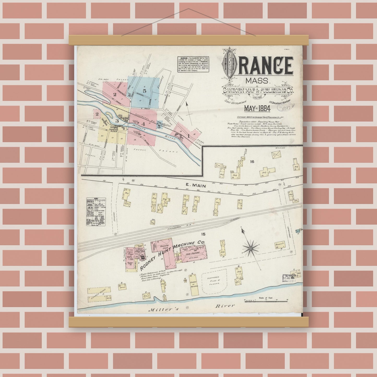 Old map wall art mockup — magnetic wood frame on brick wall — Sanborn Fire Insurance Map from Orange, Franklin County, Massachusetts (1884), Sheet #0001