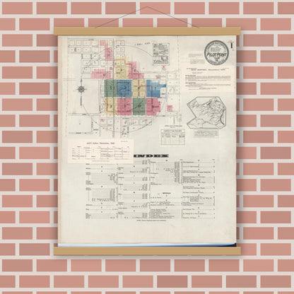 Old map wall art mockup — magnetic wood frame on brick wall — Sanborn Fire Insurance Map from Pilot Point, Denton County, Texas (1940), Sheet #0001