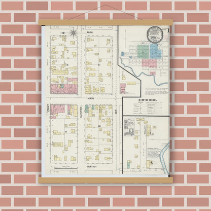 Old map wall art mockup — magnetic wood frame on brick wall — Sanborn Fire Insurance Map from Ovid, Clinton County, Michigan (1890), Sheet #0001