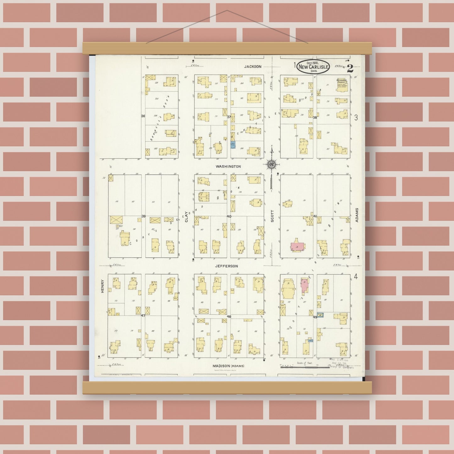Old map wall art mockup — magnetic wood frame on brick wall — Sanborn Fire Insurance Map from New Carlisle, Clarke County, Ohio (1916), Sheet #0002