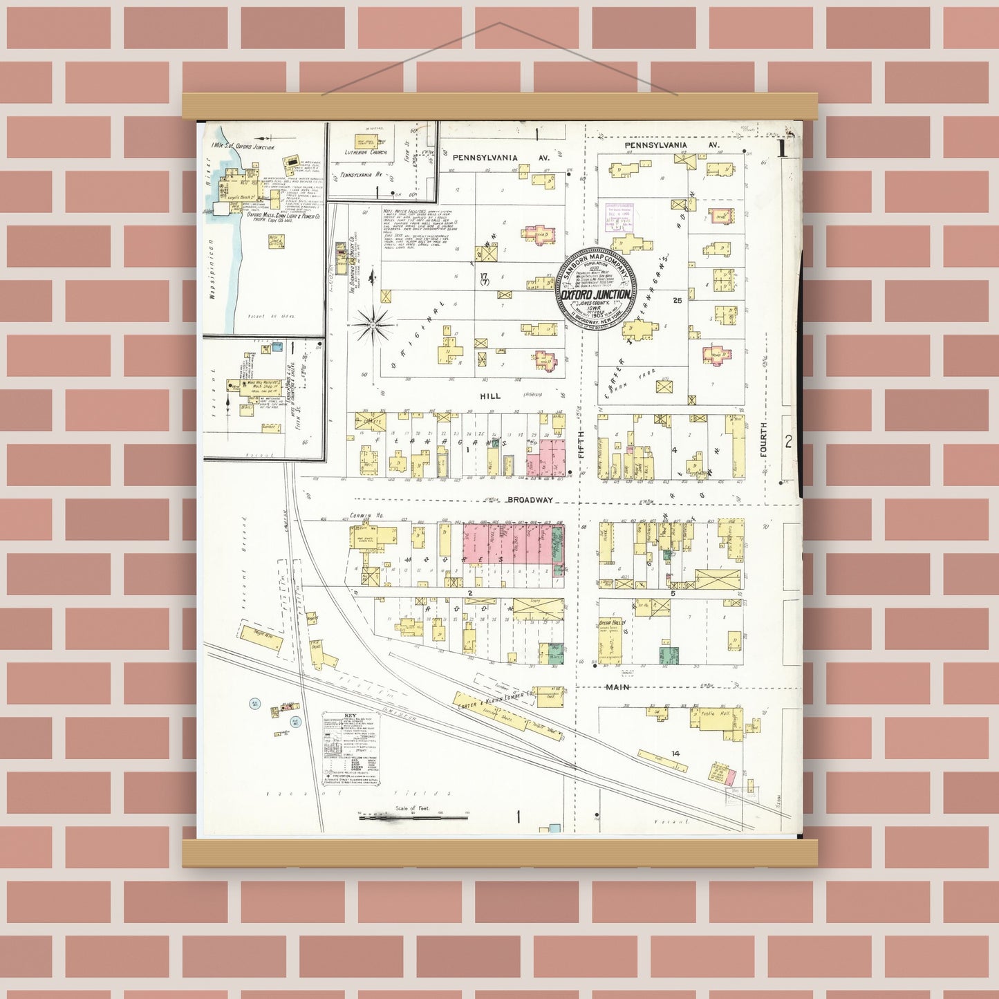 Old map wall art mockup — magnetic wood frame on brick wall — Sanborn Fire Insurance Map from Oxford Junction, Jones County, Iowa (1905), Sheet #0001