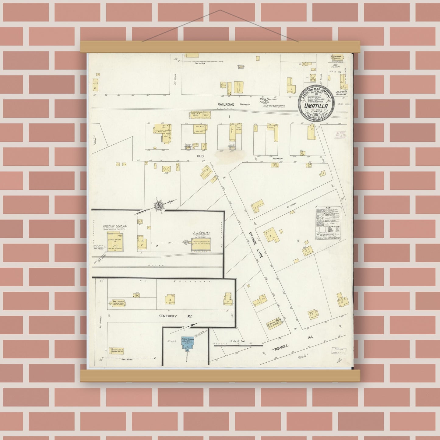 Old map wall art mockup — magnetic wood frame on brick wall — Sanborn Fire Insurance Map from Umatilla, Lake County, Florida (1912), Sheet #0001