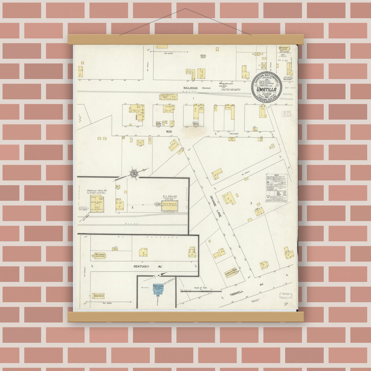 Old map wall art mockup — magnetic wood frame on brick wall — Sanborn Fire Insurance Map from Umatilla, Lake County, Florida (1912), Sheet #0001