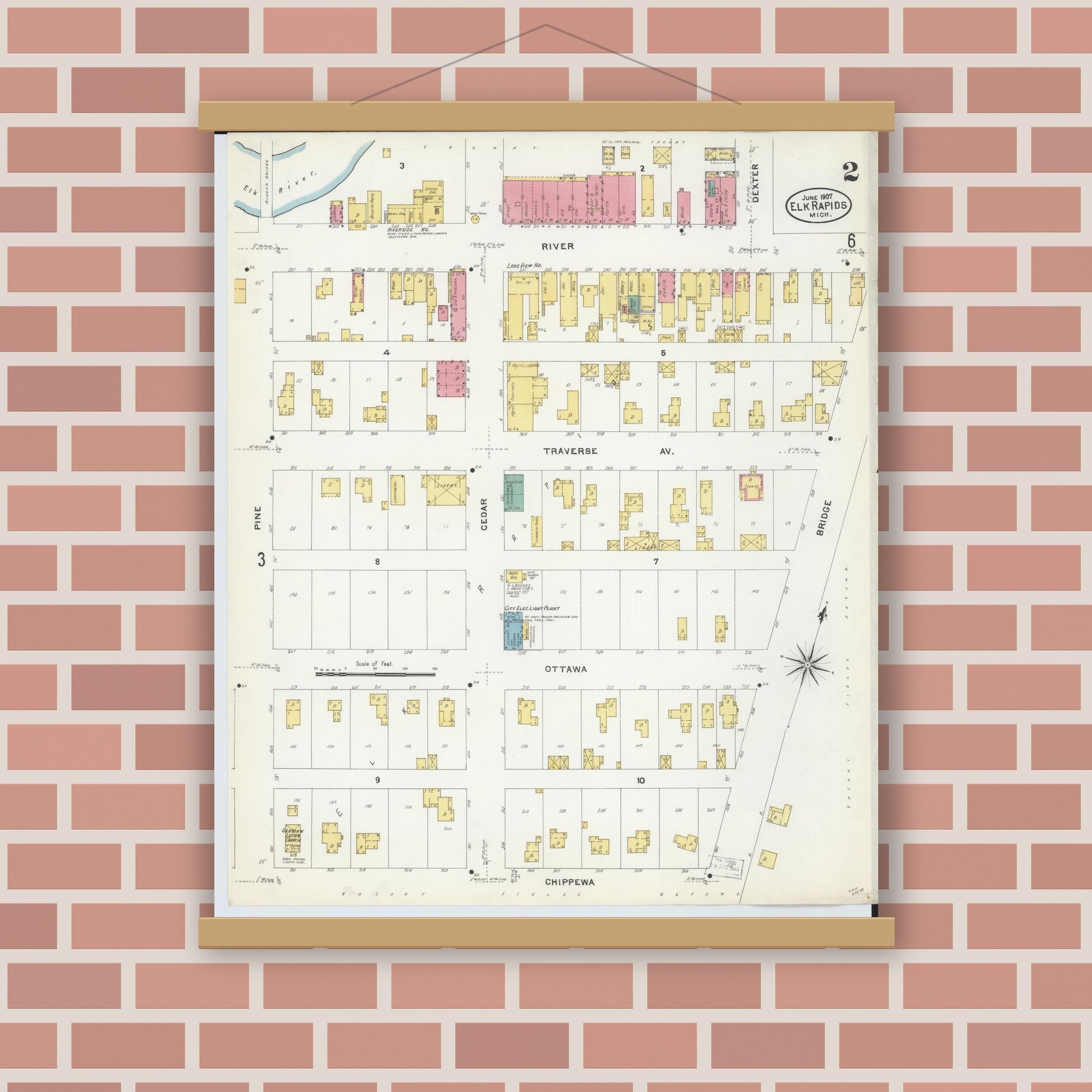 Old map wall art mockup — magnetic wood frame on brick wall — Sanborn Fire Insurance Map from Elk Rapids, Antrim County, Michigan (1907), Sheet #0002