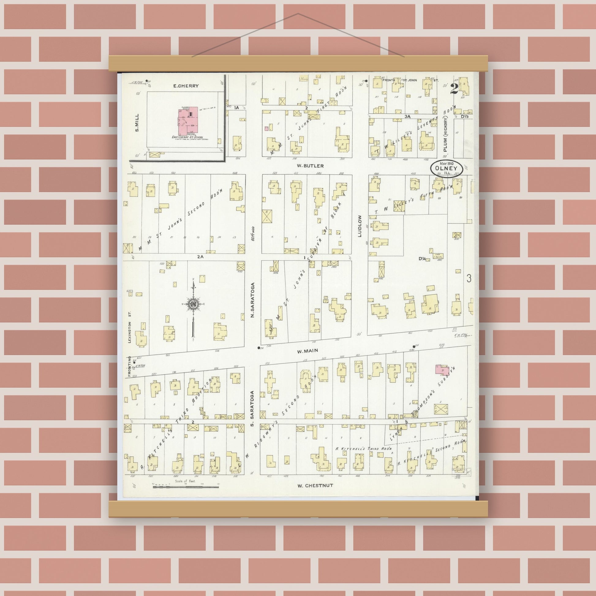 Old map wall art mockup — magnetic wood frame on brick wall — Sanborn Fire Insurance Map from Olney, Richland County, Illinois (1910), Sheet #0002