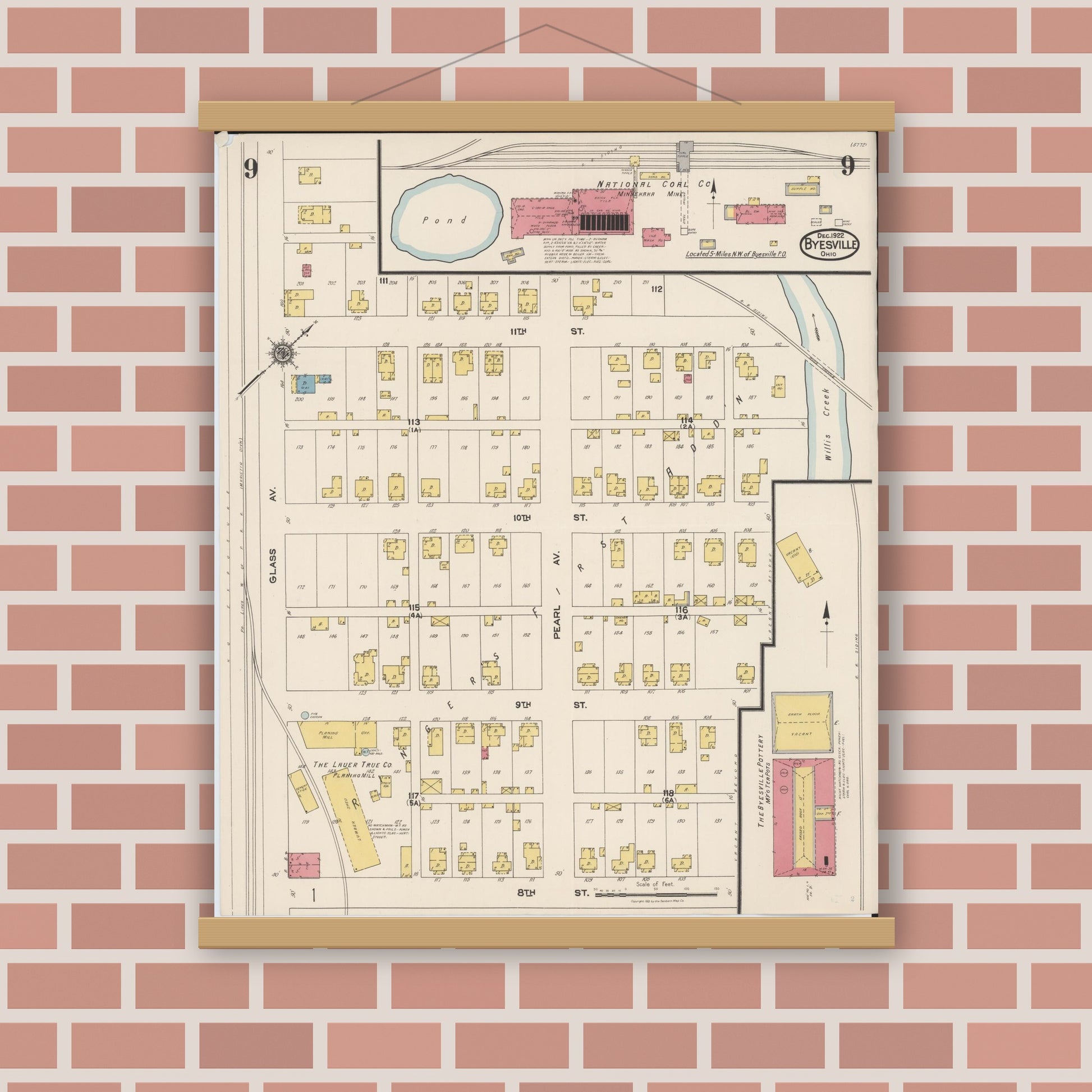 Old map wall art mockup — magnetic wood frame on brick wall — Sanborn Fire Insurance Map from Byesville, Guernsey County, Ohio (1922), Sheet #0009