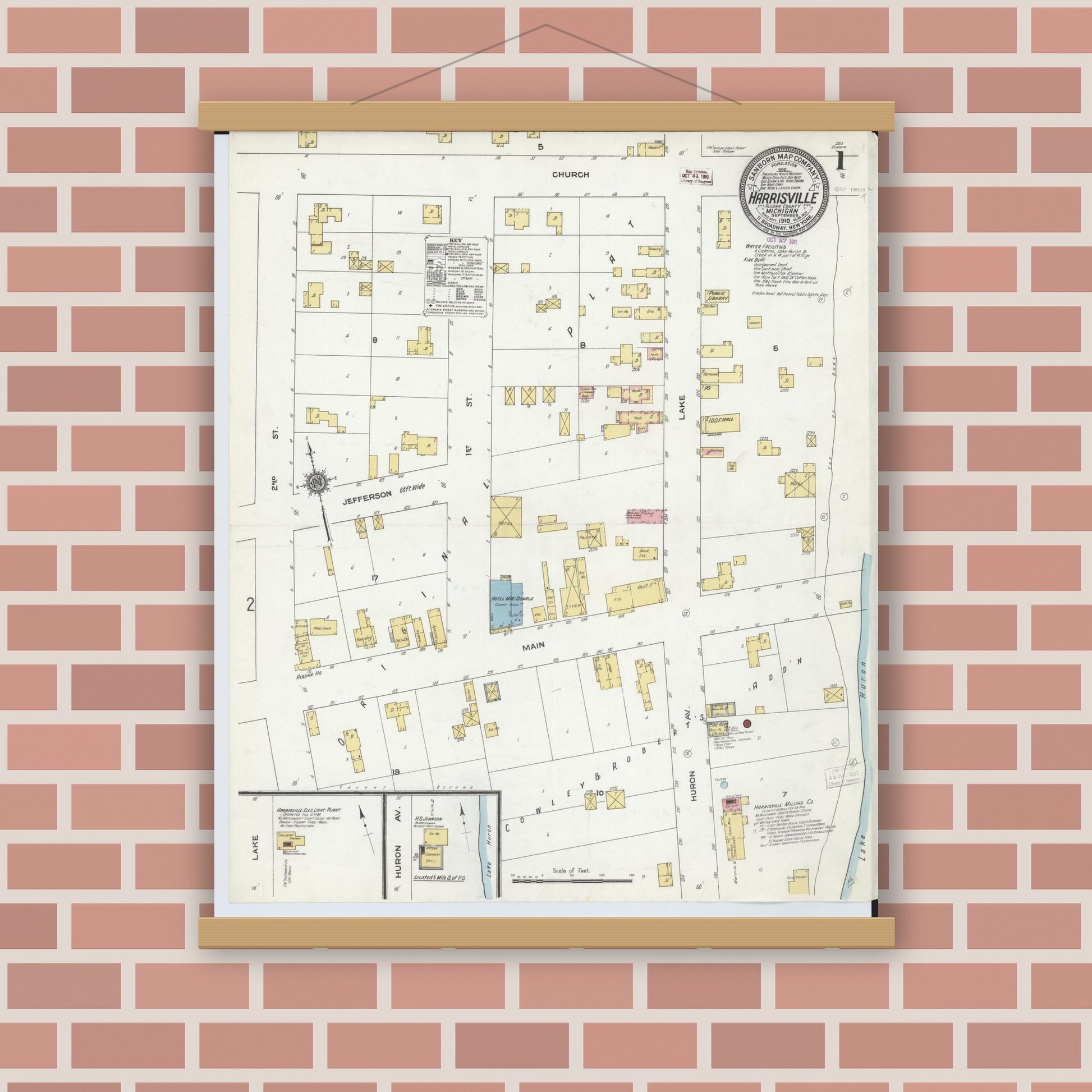 Old map wall art mockup — magnetic wood frame on brick wall — Sanborn Fire Insurance Map from Harrisville, Alcona County, Michigan (1910) - Complete Map Set