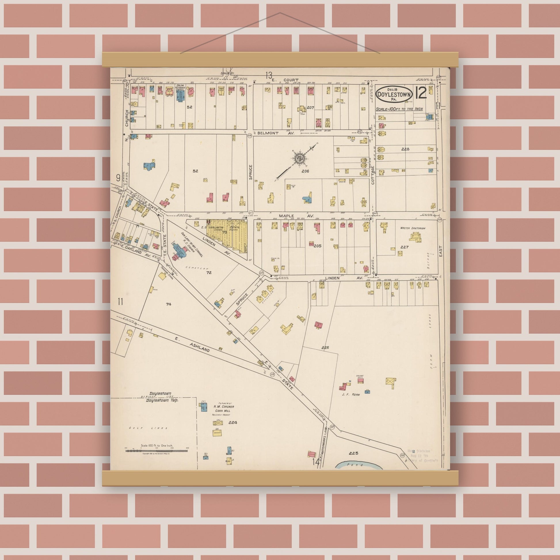 Old map wall art mockup — magnetic wood frame on brick wall — Sanborn Fire Insurance Map from Doylestown, Bucks County, Pennsylvania (1922), Sheet #0012