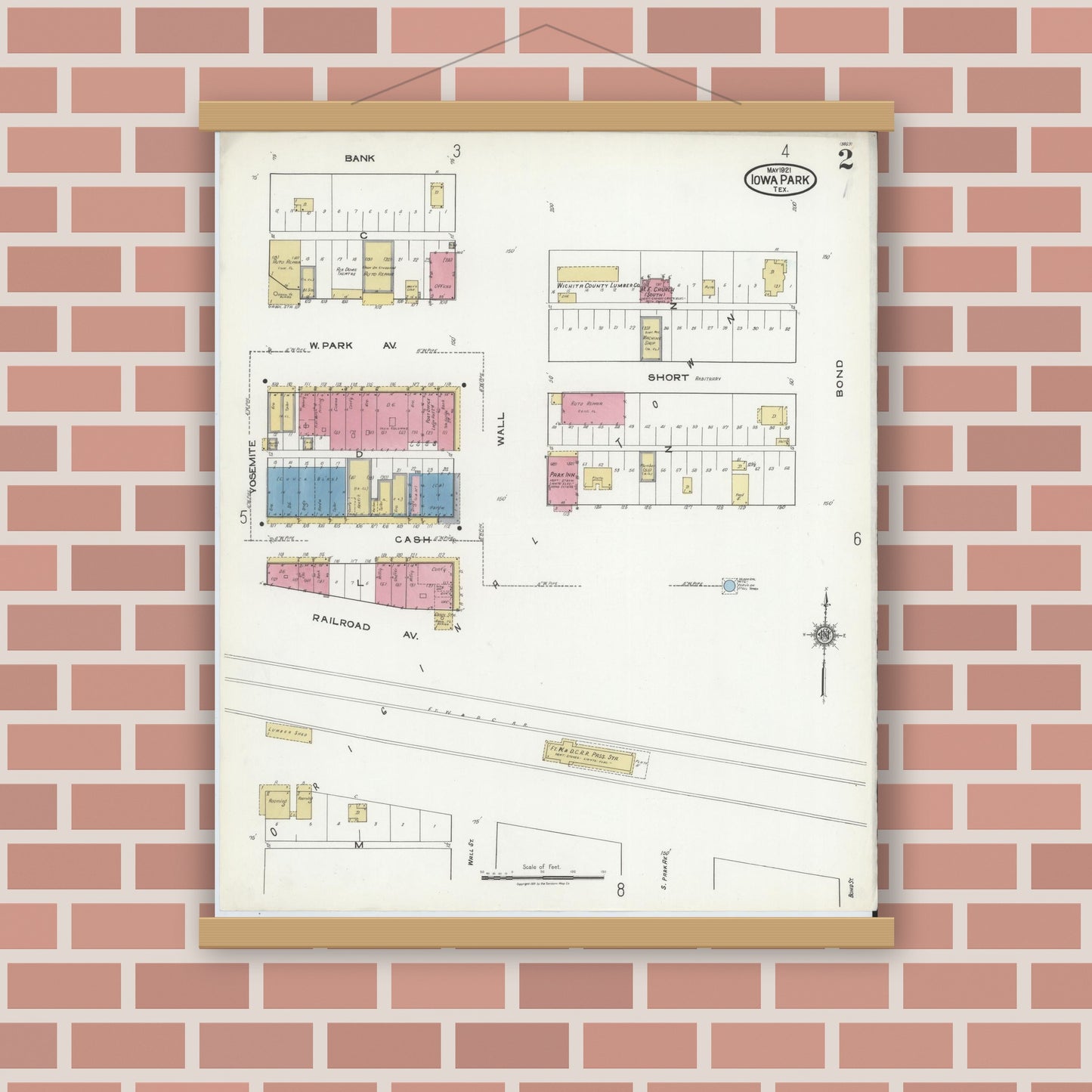 Old map wall art mockup — magnetic wood frame on brick wall — Sanborn Fire Insurance Map from Iowa Park, Wichita County, Texas (1921), Sheet #0002