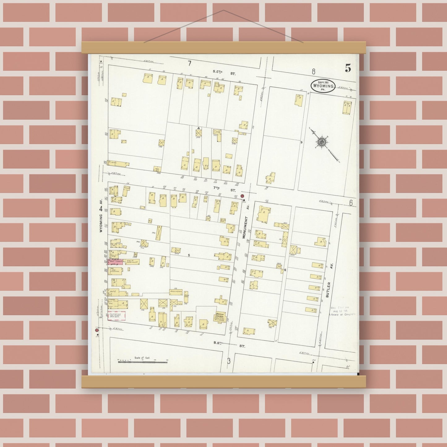Old map wall art mockup — magnetic wood frame on brick wall — Sanborn Fire Insurance Map from Wyoming, Luzerne County, Pennsylvania (1911), Sheet #0005