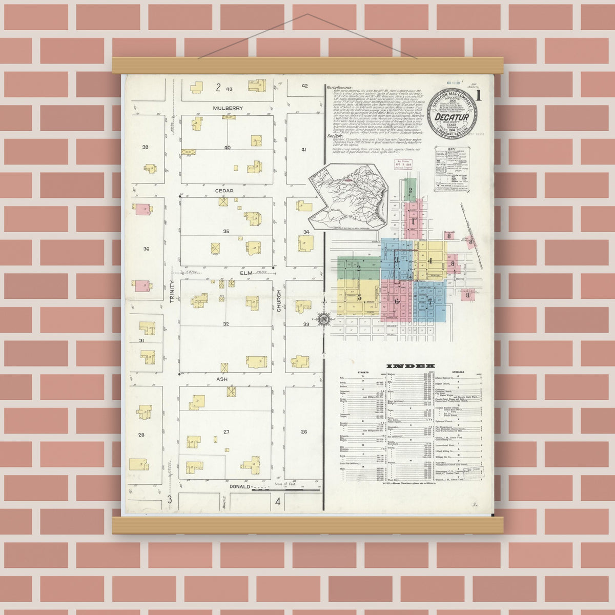 Old map wall art mockup — magnetic wood frame on brick wall — Sanborn Fire Insurance Map from Decatur, Wise County, Texas (1914), Sheet #0001