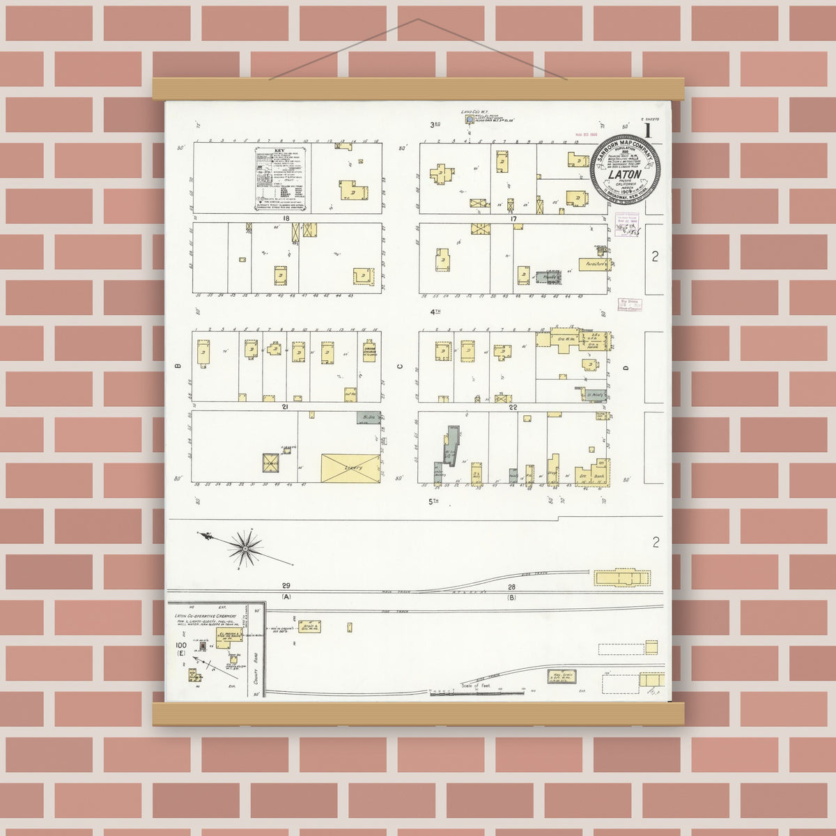 Old map wall art mockup — magnetic wood frame on brick wall — Sanborn Fire Insurance Map from Laton, Fresno County, California (1909), Sheet #0001