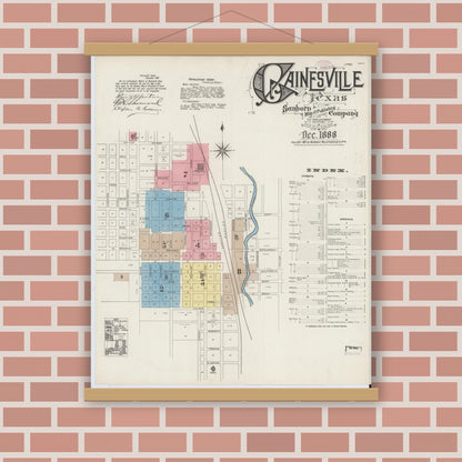 Old map wall art mockup — magnetic wood frame on brick wall — Sanborn Fire Insurance Map from Gainesville, Cooke County, Texas (1888), Sheet #0001