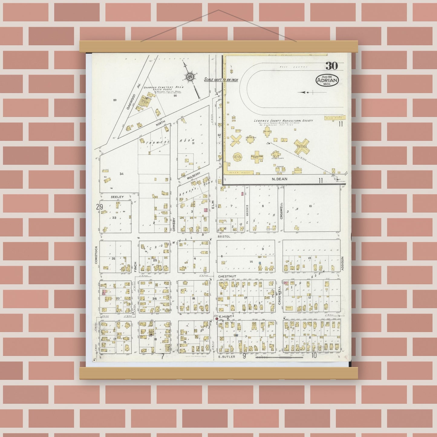Old map wall art mockup — magnetic wood frame on brick wall — Sanborn Fire Insurance Map from Adrian, Lenawee County, Michigan (1916), Sheet #0030