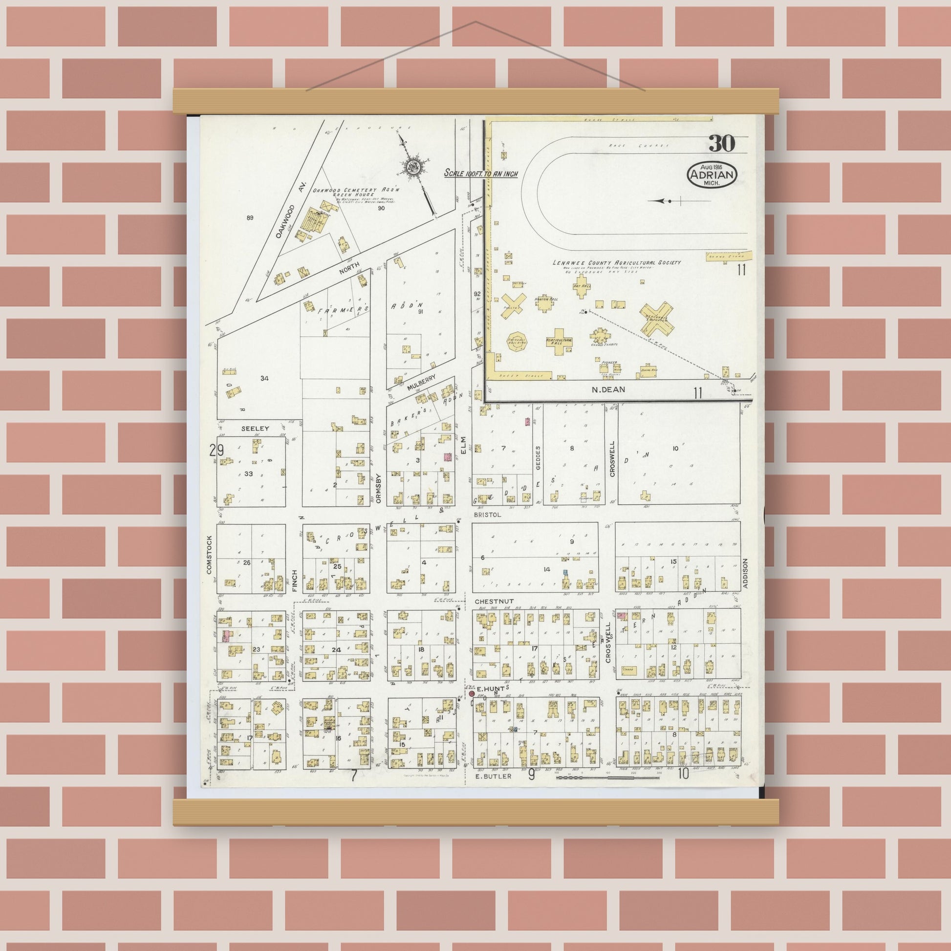 Old map wall art mockup — magnetic wood frame on brick wall — Sanborn Fire Insurance Map from Adrian, Lenawee County, Michigan (1916), Sheet #0030
