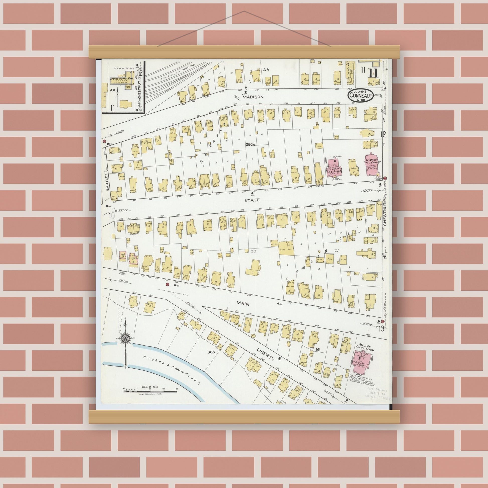 Old map wall art mockup — magnetic wood frame on brick wall — Sanborn Fire Insurance Map from Conneaut, Ashtabula County, Ohio (1919), Sheet #0011