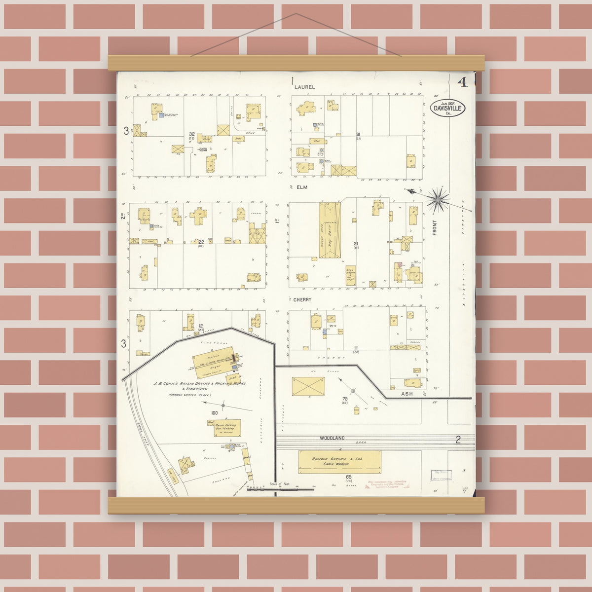 Old map wall art mockup — magnetic wood frame on brick wall — Sanborn Fire Insurance Map from Davis, Yolo County, California (1907), Sheet #0004